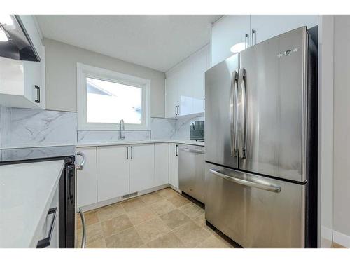 23 Martinwood Court Ne, Calgary, AB - Indoor Photo Showing Kitchen