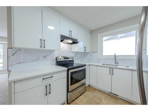 23 Martinwood Court Ne, Calgary, AB - Indoor Photo Showing Kitchen