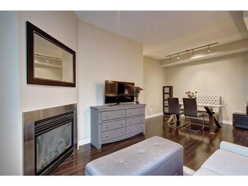 308-108 25 Avenue Sw, Calgary, AB - Indoor Photo Showing Living Room With Fireplace