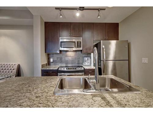 308-108 25 Avenue Sw, Calgary, AB - Indoor Photo Showing Kitchen With Stainless Steel Kitchen With Double Sink With Upgraded Kitchen