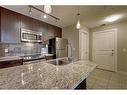 308-108 25 Avenue Sw, Calgary, AB  - Indoor Photo Showing Kitchen With Stainless Steel Kitchen With Double Sink With Upgraded Kitchen 