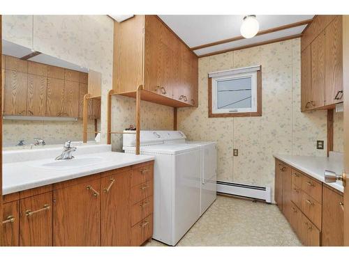 213 Centre Avenue Se, Airdrie, AB - Indoor Photo Showing Laundry Room