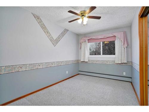 213 Centre Avenue Se, Airdrie, AB - Indoor Photo Showing Other Room