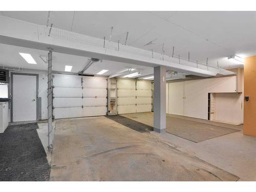 213 Centre Avenue Se, Airdrie, AB - Indoor Photo Showing Garage