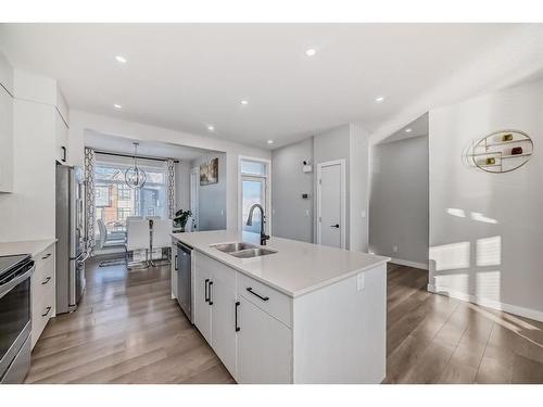 67 Sage Meadows Circle Nw, Calgary, AB - Indoor Photo Showing Kitchen With Double Sink With Upgraded Kitchen