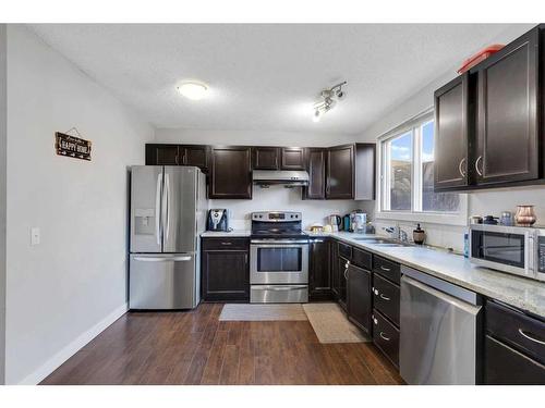 87 Edgehill Drive, Calgary, AB - Indoor Photo Showing Kitchen With Double Sink