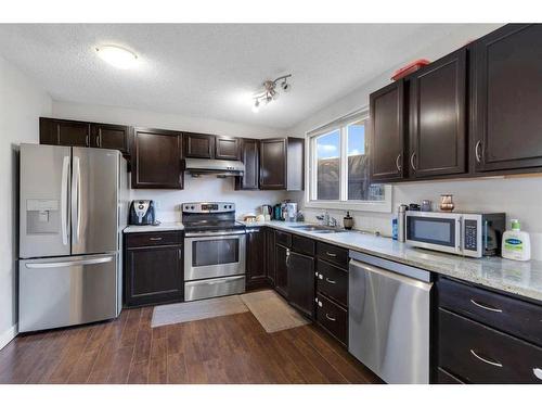 87 Edgehill Drive, Calgary, AB - Indoor Photo Showing Kitchen With Double Sink