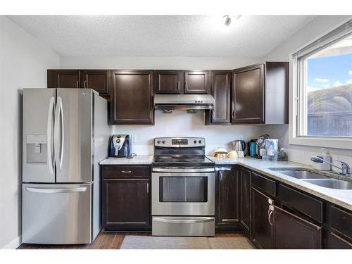 87 Edgehill Drive, Calgary, AB - Indoor Photo Showing Kitchen With Double Sink