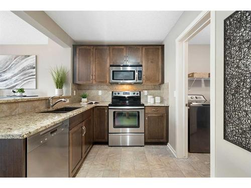 117 Sage Valley Drive Nw, Calgary, AB - Indoor Photo Showing Kitchen With Stainless Steel Kitchen