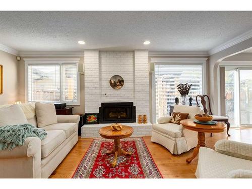 14228 Park Estates Drive Se, Calgary, AB - Indoor Photo Showing Living Room With Fireplace