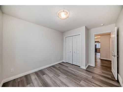 1453 Bayview Point Sw, Airdrie, AB - Indoor Photo Showing Other Room