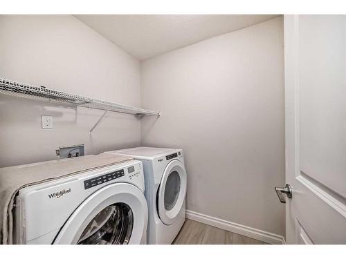 1453 Bayview Point Sw, Airdrie, AB - Indoor Photo Showing Laundry Room