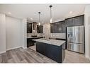 1453 Bayview Point Sw, Airdrie, AB  - Indoor Photo Showing Kitchen With Stainless Steel Kitchen With Double Sink With Upgraded Kitchen 