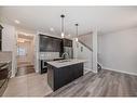 1453 Bayview Point Sw, Airdrie, AB  - Indoor Photo Showing Kitchen With Upgraded Kitchen 