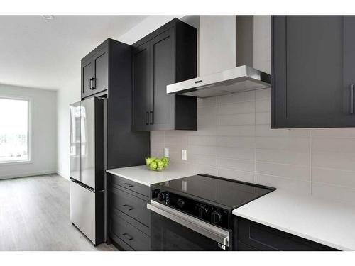 216-85 Sage Hill Heights Nw, Calgary, AB - Indoor Photo Showing Kitchen With Upgraded Kitchen