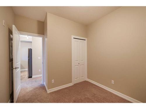 320-117 Copperpond Common Se, Calgary, AB - Indoor Photo Showing Other Room