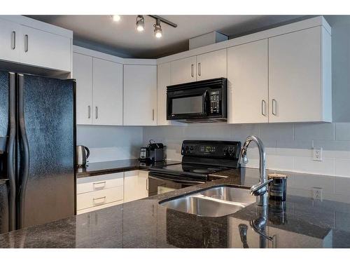 1310-1410 1 Street Se, Calgary, AB - Indoor Photo Showing Kitchen With Double Sink