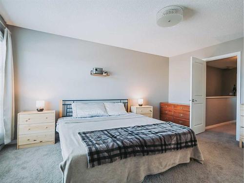 66 Walden Crescent Se, Calgary, AB - Indoor Photo Showing Bedroom