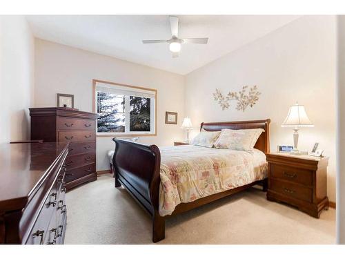 119 Rocky Ridge Villas Nw, Calgary, AB - Indoor Photo Showing Bedroom