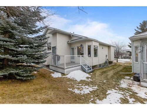 119 Rocky Ridge Villas Nw, Calgary, AB - Outdoor With Exterior