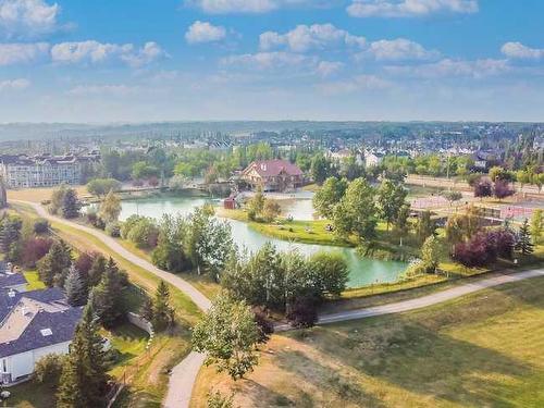 119 Rocky Ridge Villas Nw, Calgary, AB - Outdoor With Body Of Water With View