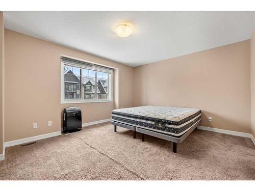 513-121 Copperpond Common Se, Calgary, AB - Indoor Photo Showing Bedroom