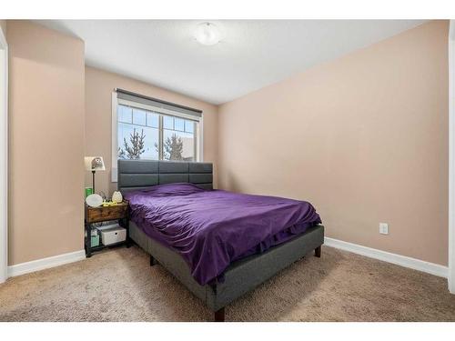 513-121 Copperpond Common Se, Calgary, AB - Indoor Photo Showing Bedroom