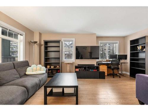 513-121 Copperpond Common Se, Calgary, AB - Indoor Photo Showing Living Room