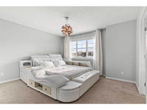 230 Hillcrest Square Sw, Airdrie, AB - Indoor Photo Showing Bedroom