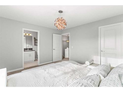 230 Hillcrest Square Sw, Airdrie, AB - Indoor Photo Showing Bedroom