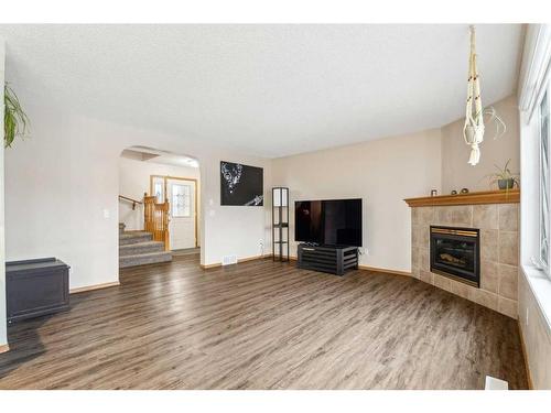 47 Harvest Park Circle Ne, Calgary, AB - Indoor Photo Showing Living Room With Fireplace