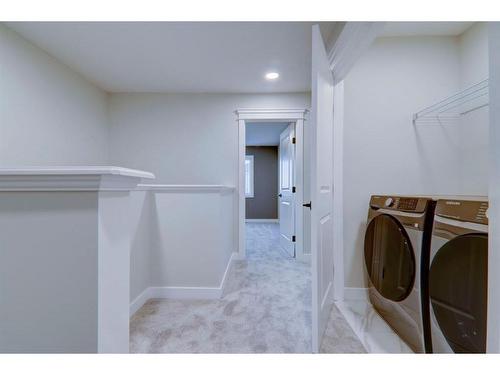 32 Veranda Boulevard Sw, Calgary, AB - Indoor Photo Showing Laundry Room