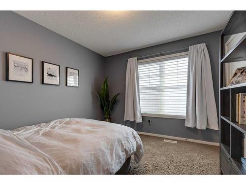 320 Ascot Circle Sw, Calgary, AB - Indoor Photo Showing Bedroom