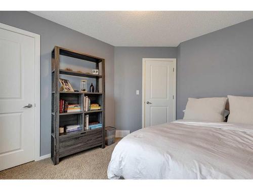 320 Ascot Circle Sw, Calgary, AB - Indoor Photo Showing Bedroom