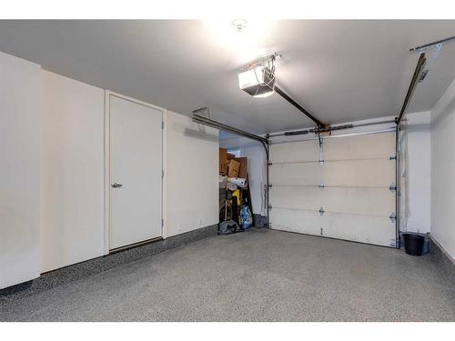 320 Ascot Circle Sw, Calgary, AB - Indoor Photo Showing Garage