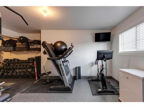 320 Ascot Circle Sw, Calgary, AB - Indoor Photo Showing Gym Room