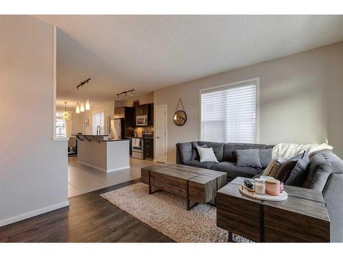 320 Ascot Circle Sw, Calgary, AB - Indoor Photo Showing Living Room