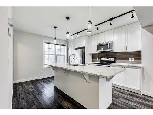 49 Evanscrest Court Nw, Calgary, AB - Indoor Photo Showing Kitchen With Stainless Steel Kitchen With Upgraded Kitchen