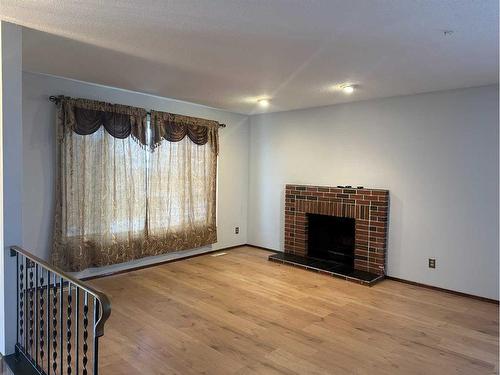 3833 Dover Ridge Drive Se, Calgary, AB - Indoor With Fireplace