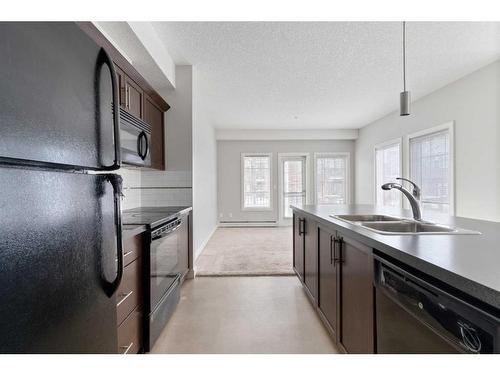 143-20 Royal Oak Plaza Nw, Calgary, AB - Indoor Photo Showing Kitchen With Double Sink