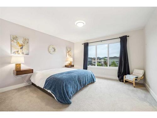 101 Mist Mountain Rise, Okotoks, AB - Indoor Photo Showing Bedroom