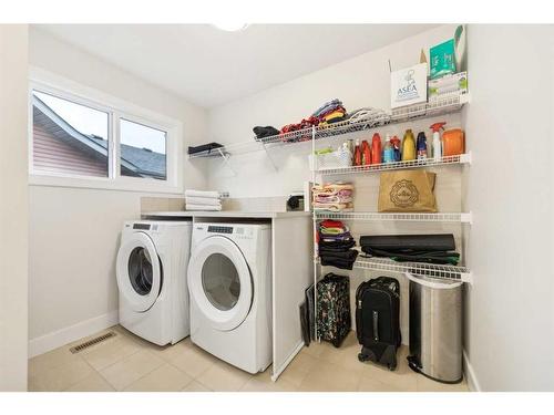 101 Mist Mountain Rise, Okotoks, AB - Indoor Photo Showing Laundry Room