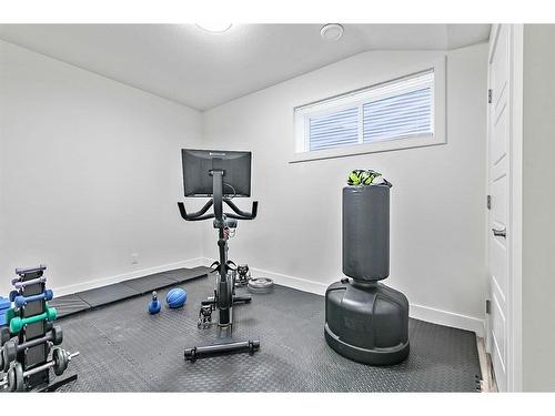 101 Mist Mountain Rise, Okotoks, AB - Indoor Photo Showing Gym Room