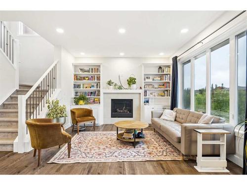 101 Mist Mountain Rise, Okotoks, AB - Indoor Photo Showing Living Room With Fireplace