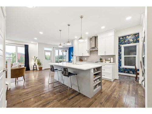 101 Mist Mountain Rise, Okotoks, AB - Indoor Photo Showing Kitchen With Upgraded Kitchen