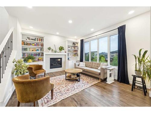 101 Mist Mountain Rise, Okotoks, AB - Indoor Photo Showing Living Room With Fireplace