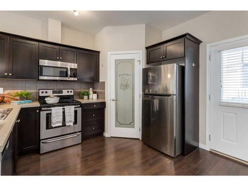 3904-1001 8 Street Nw, Airdrie, AB - Indoor Photo Showing Kitchen With Stainless Steel Kitchen With Double Sink