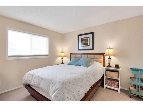 213 Harvest Gold Circle Ne, Calgary, AB - Indoor Photo Showing Bedroom