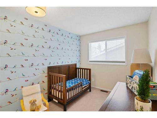 213 Harvest Gold Circle Ne, Calgary, AB - Indoor Photo Showing Bedroom