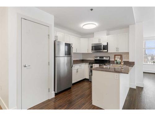 427-955 Mcpherson Road Ne, Calgary, AB - Indoor Photo Showing Kitchen With Stainless Steel Kitchen